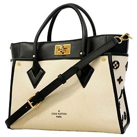 Borsa Louis Vuitton Monogram Tuffetage On My Side MM Nero Bianco sporco
