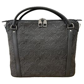 Borsa a mano in pelle Louis Vuitton Ixia PM Marrone Nero