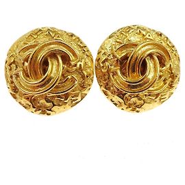 Chanel Vintage Boucles d'oreilles clips rondes CC en métal Doré