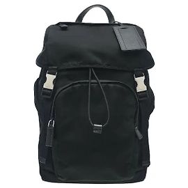 A backpack harmonizing lightweight yet sturdy Tessuto nylon material with luxurious Saffiano leather detailing. Prada's distinctively practical design offers a spacious interior for efficiently Black