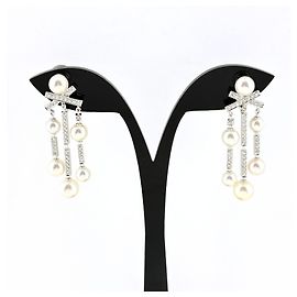 Boucles d'oreilles clips Chanel Diamant et Perle Autre