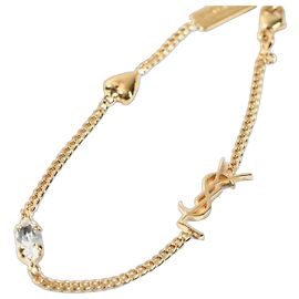 Saint Laurent Bracelet avec breloque cœur Doré