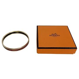 Hermès Hermes Bangle Bracelet in Gold with Rouge Enamel Golden