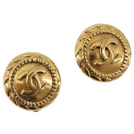 Chanel Vintage Boucles d'oreilles clips rondes CC en métal Doré
