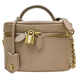 Louis Vuitton Vanity Monogram Empreinte Giant PM Beige