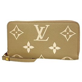 Cartera Zippy Louis Vuitton Monogram Empreinte Bicolor Beige
