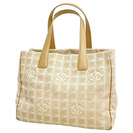 Saco Tote Chanel New Travel em nylon Bege