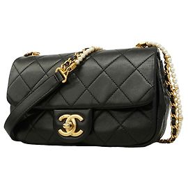 Borsa a tracolla Chanel Mini Matelassé con catena Nero