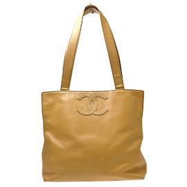 Bolsa Chanel Vintage CC Logo em couro Small Bege