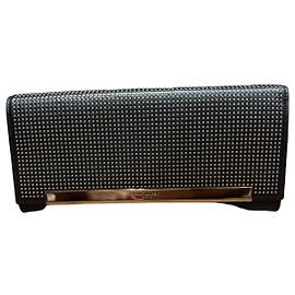 Saint Laurent Clutch aus schwarzem Leder mit Nieten Schwarz