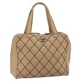 CHANEL Bolsa Tote Wild Stitch Couro Bege CC Outro