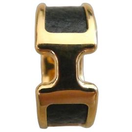 Anel Hermès Olympe H em aço dourado e couro preto Preto Dourado