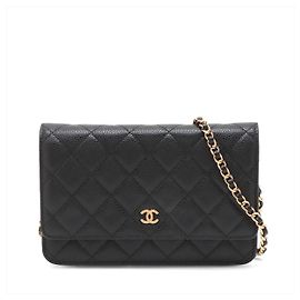 Chanel WOC em couro Caviar acolchoado com aba Crossbody Black Preto