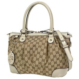 Bolsa Gucci em lona GG bege Bege