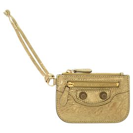 Balenciaga Le Cagol Monedero de piel dorado Dorado