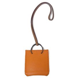 Hermès Hermes Handbag Charm in Feu and Gold Red Golden