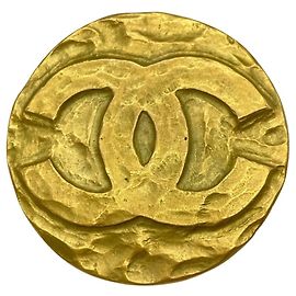 Spilla rotonda Chanel Coco Mark in oro D'oro