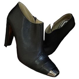 Christian Dior black leather ankle boots with metallic toe Black