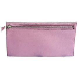 Hermès Pochette zippée HERMES en cuir Chevre rose Rose