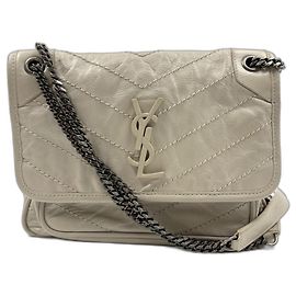 Bolsa Yves Saint Laurent Niki Baby Bege