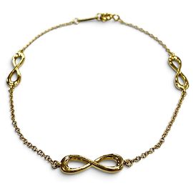 Tiffany & Co Bracciale con charm Tiffany Infinity Endless in oro giallo D'oro
