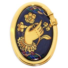 Broche Hermès dourado Dourado