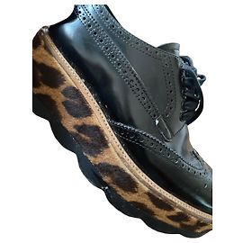Prada Black leather and leopard print platform oxfords Black Leopard print