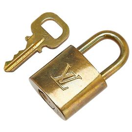 Ensemble Cadenas et Clé Louis Vuitton Doré Métallisé