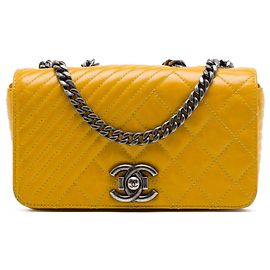 Borsa a tracolla Chanel Small Coco Boy Flap in vitello glassato giallo Giallo