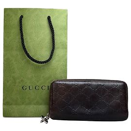 Vintage Gucci GG Embossed Leather Zip Wallet Brown Brown