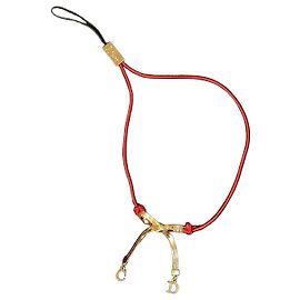 Bracciale Dior con cordoncino rosso e fiocco Rosso D'oro