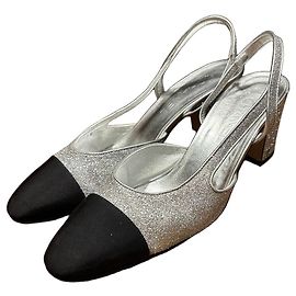 Chanel Silver Glitter Slingback Heels with Black Cap Toe Black Silver hardware