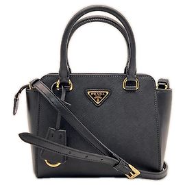 Sac à main Prada en cuir Saffiano avec logo triangle Noir