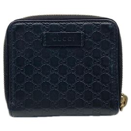 Cartera compacta bi-fold GUCCI MicroGuccissima Negro