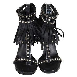 Sandali T-Strap Saint Laurent in pelle nera con borchie e frange Nero
