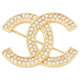 Chanel Broche CC dourada com strass Dourado