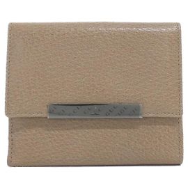 Cartera bi-fold Gucci en cuero beige Beige