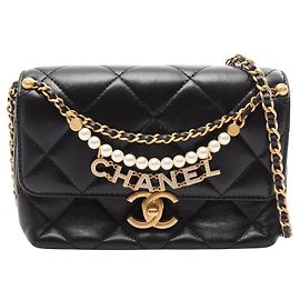 Bolso Mini Flap Chanel Matelassé Negro