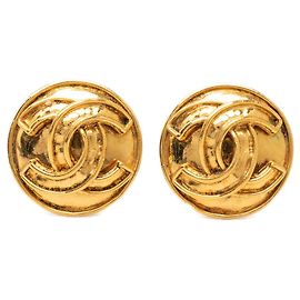 Orecchini a clip rotondi Chanel CC placcati oro D'oro