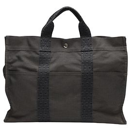 Hermès Borsa Tote Hermes in nylon grigio Marrone
