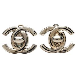 Orecchini a clip vintage Chanel Coco Mark Argento