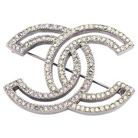 Broche Chanel Coco Mark Prata Outro