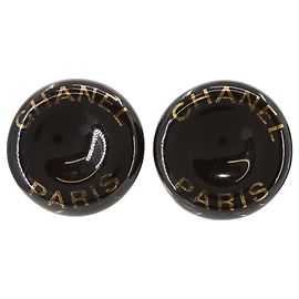 Orecchini a clip Chanel in nero e oro Nero D'oro