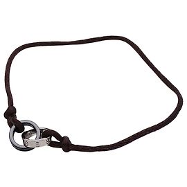 Pulsera Cartier Baby Love con dije Castaño Negro Blanco