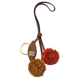 Pingente de bolsa e chaveiro Miu Miu em couro Trick Laranja