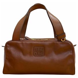 Borsa Miu Miu con manico superiore in pelle antique e logo Marrone