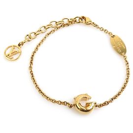 Bracelet à breloques en or Louis Vuitton Doré