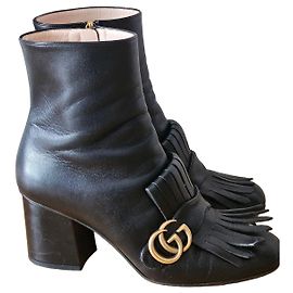 Botines Gucci GG Marmont de piel negra con flecos Negro