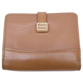Miu Miu Bi-fold Wallet in Caramel Other