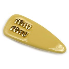 Pinza para el pelo de piel charol Miu Miu Amarillo